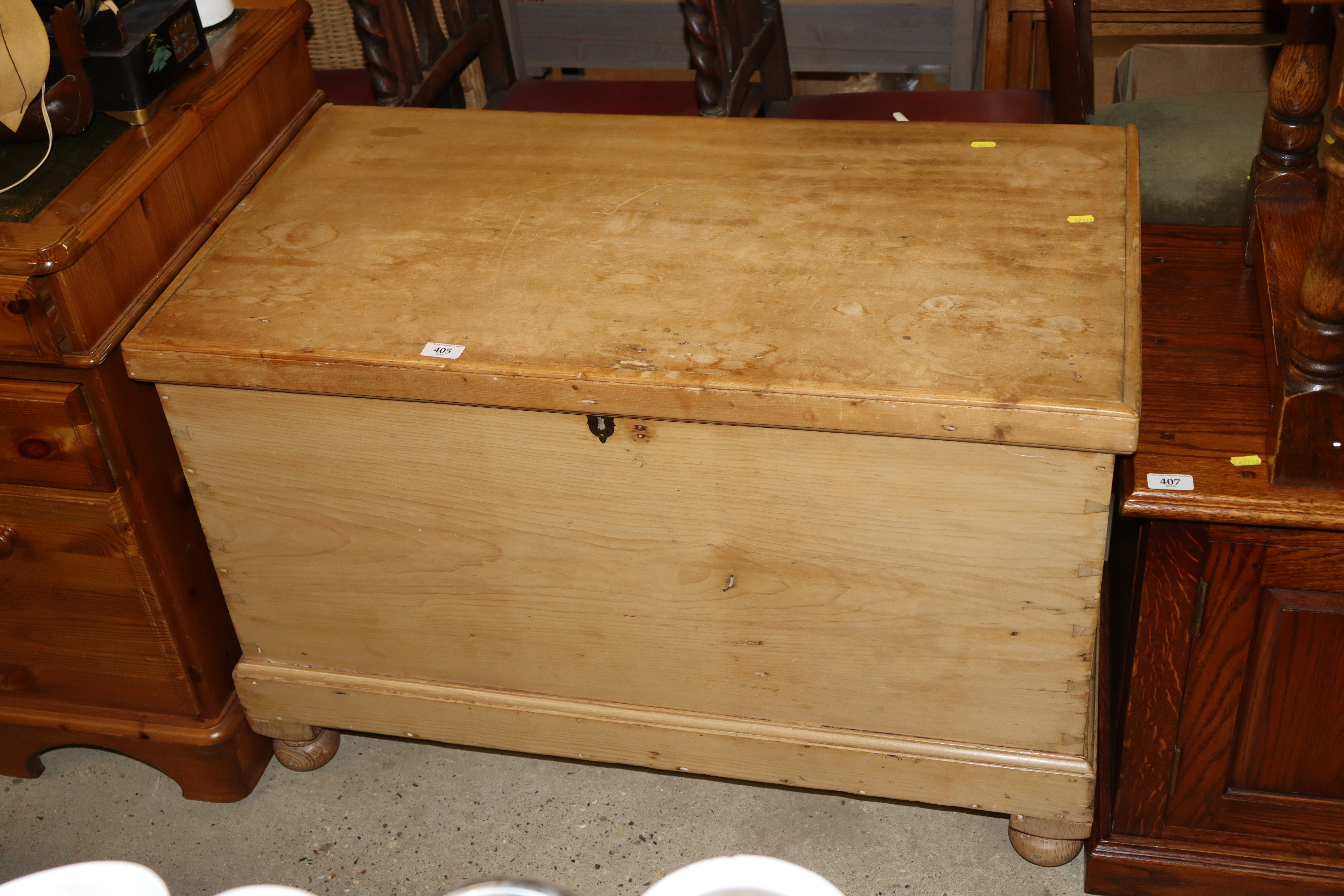 A pine blanket box with candle box interior
