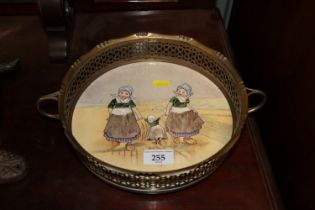 A continental pottery coaster / tray decorated wit