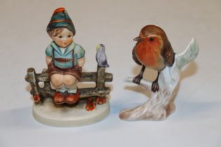 A Goebel figure; and a Goebel model of a robin