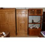 A pine single door wardrobe fitted single drawer b