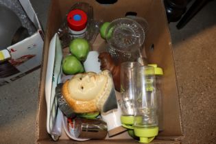 A box containing various glassware, artificial fru