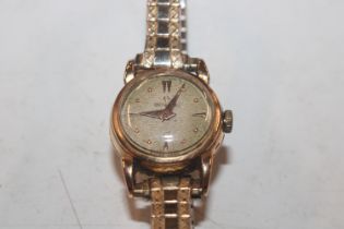 A ladies 18ct gold cased Omega wrist watch
