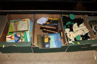 Three boxes containing children's books; Tri-ang m