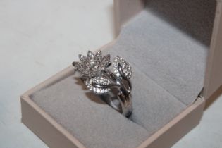 A Sterling silver diamond and cubic zirconia flowe