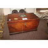 A George III mahogany and chequer edged tea caddy
