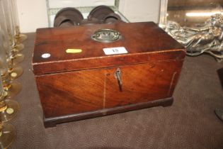 A George III mahogany and chequer edged tea caddy