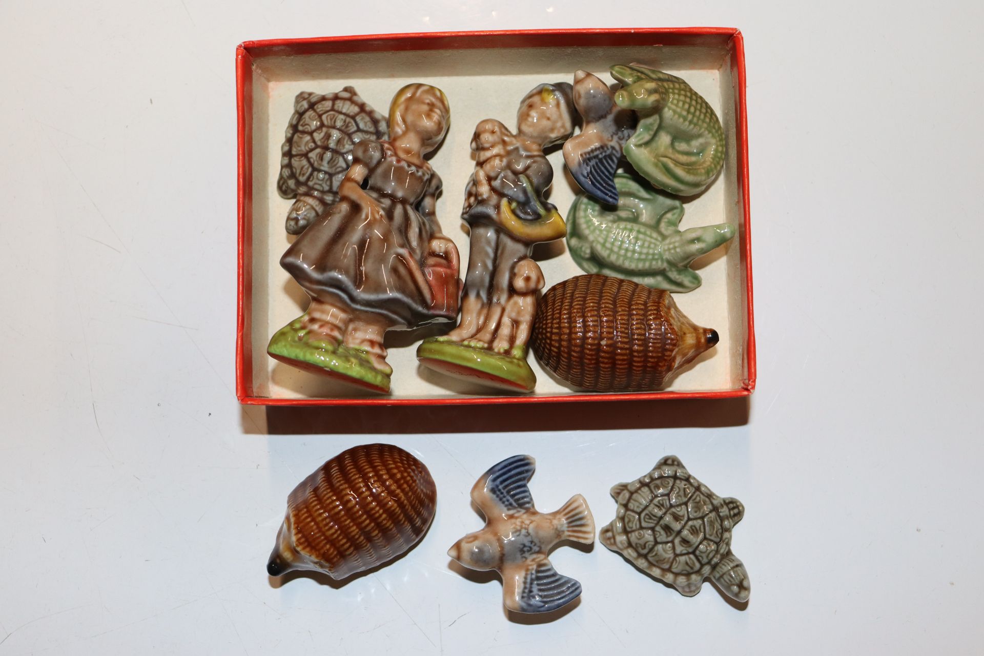 A box containing Wade Whimsies; Royal Doulton "Sch - Image 16 of 35