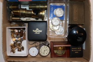 A box containing a brass microscope, various cuff-