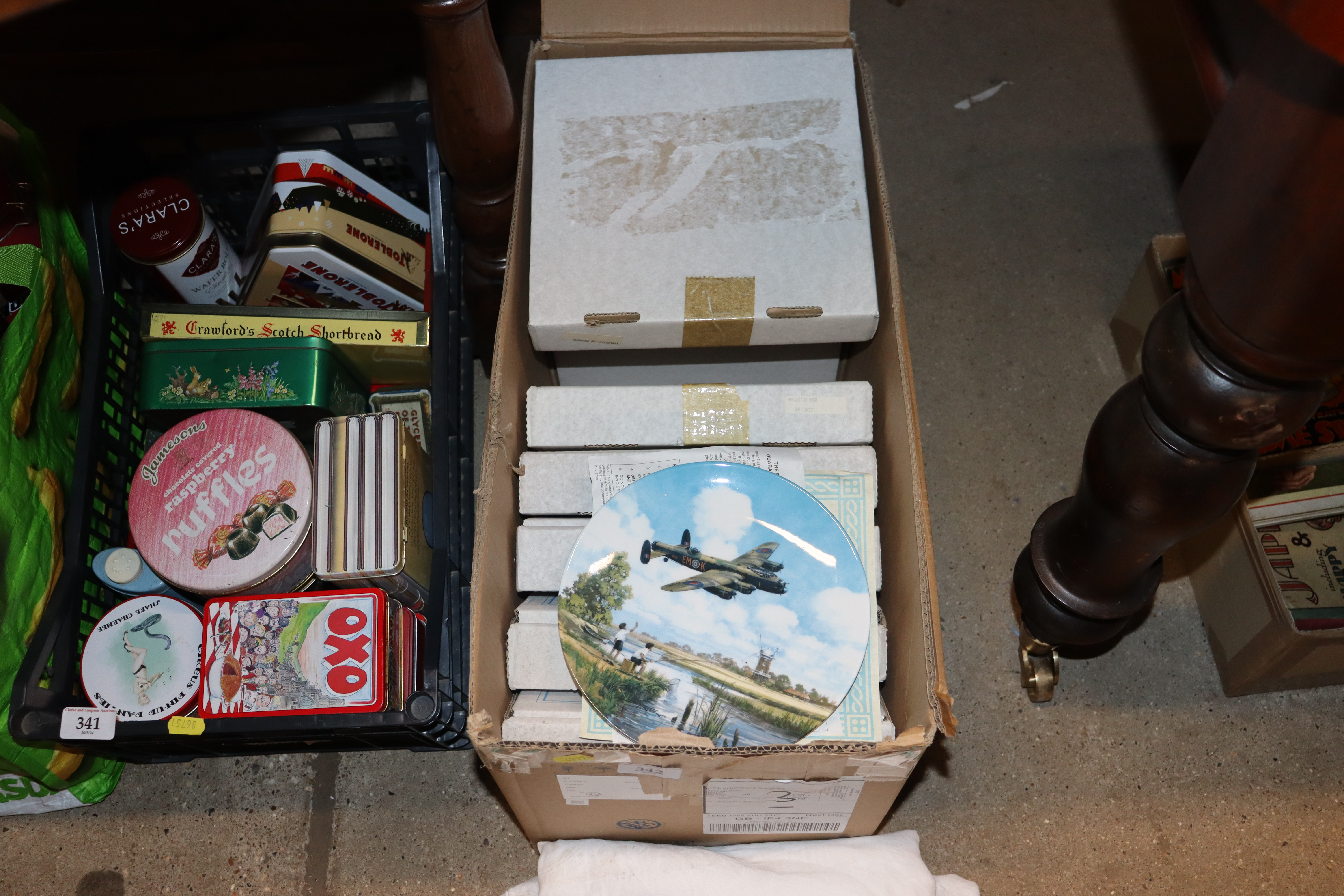 A box containing Royal Doulton collector's plates