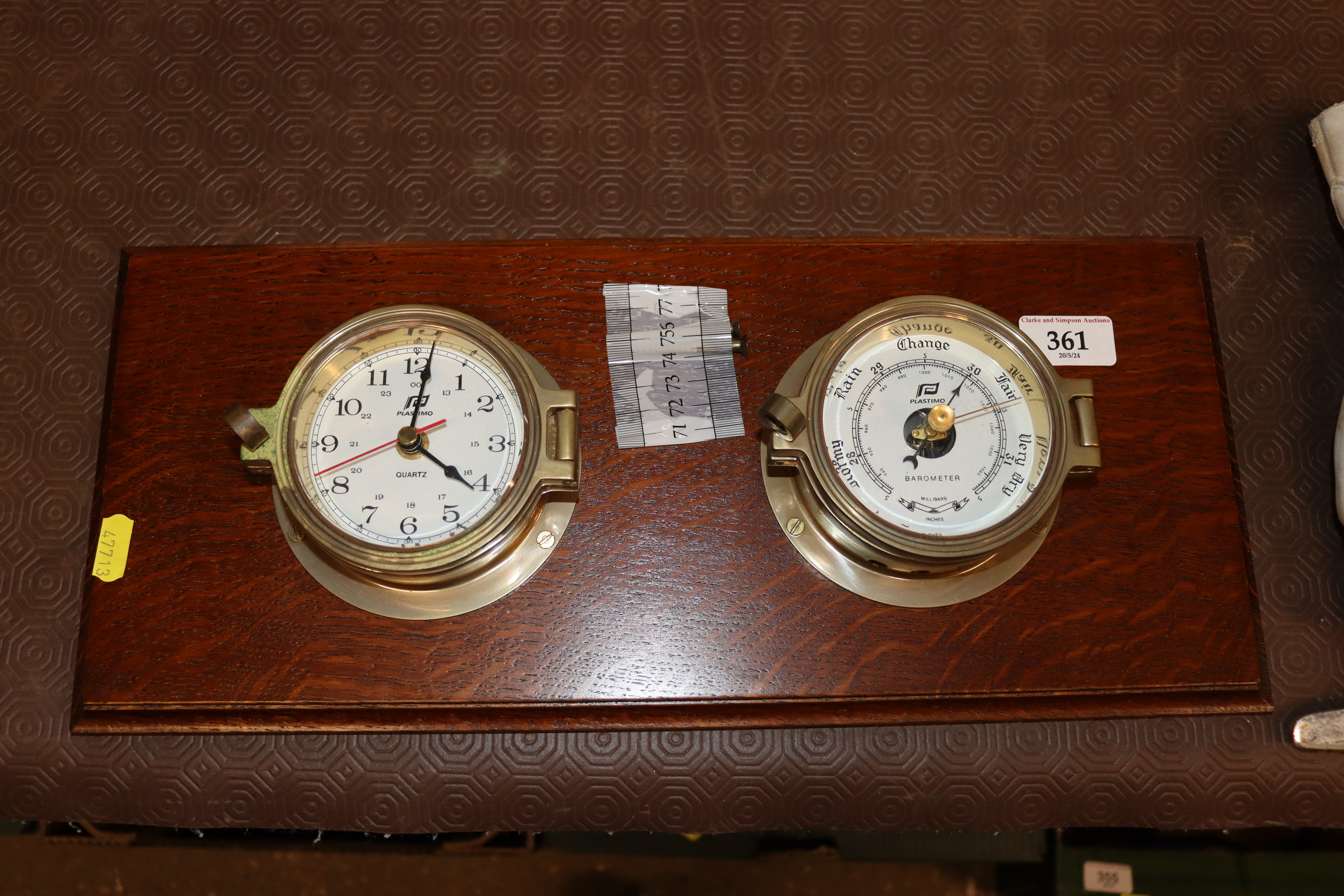 An oak mounted clock barometer