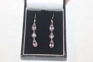 A pair of 924 silver amethyst and moonstone set ea