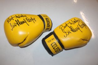 A pair of boxing gloves, signed "With Best Wishes,