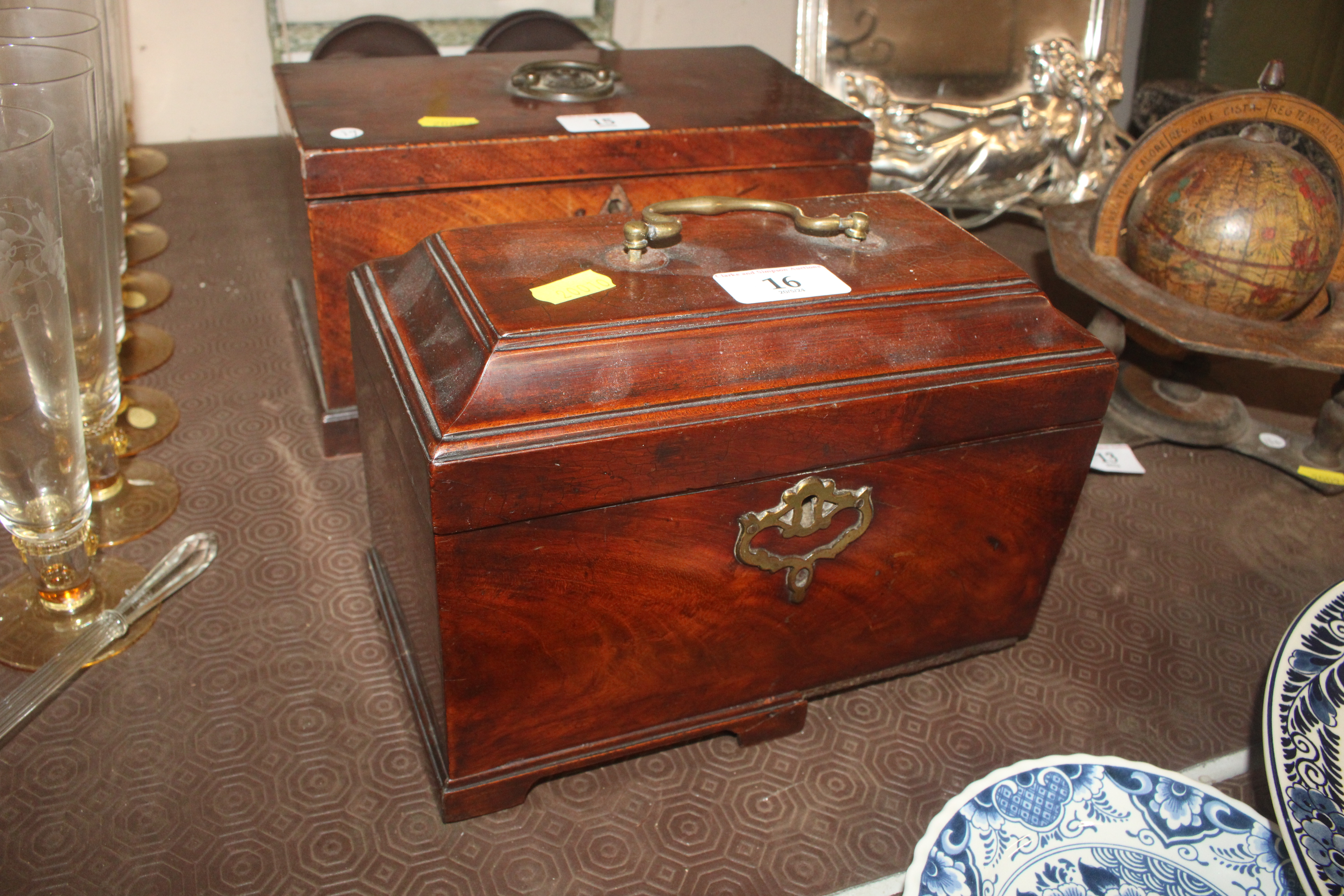 A George III mahogany tea caddy with secret compar