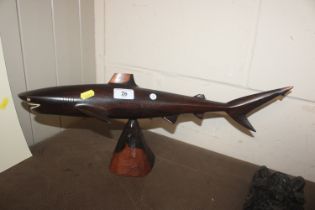 A large Polynesian carved hardwood shark with teet