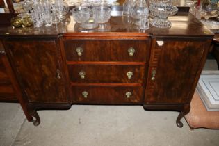 A mahogany sideboard fitted three central drawers