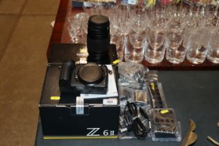 A Nikon 26-2 camera body and a Nikon Nikkor Z moun