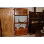 A solid teak wall unit