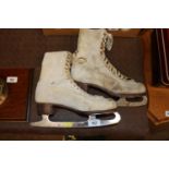 A pair of vintage ice skates
