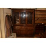 Period Oak Reproductions Ltd. bookcase raised on c
