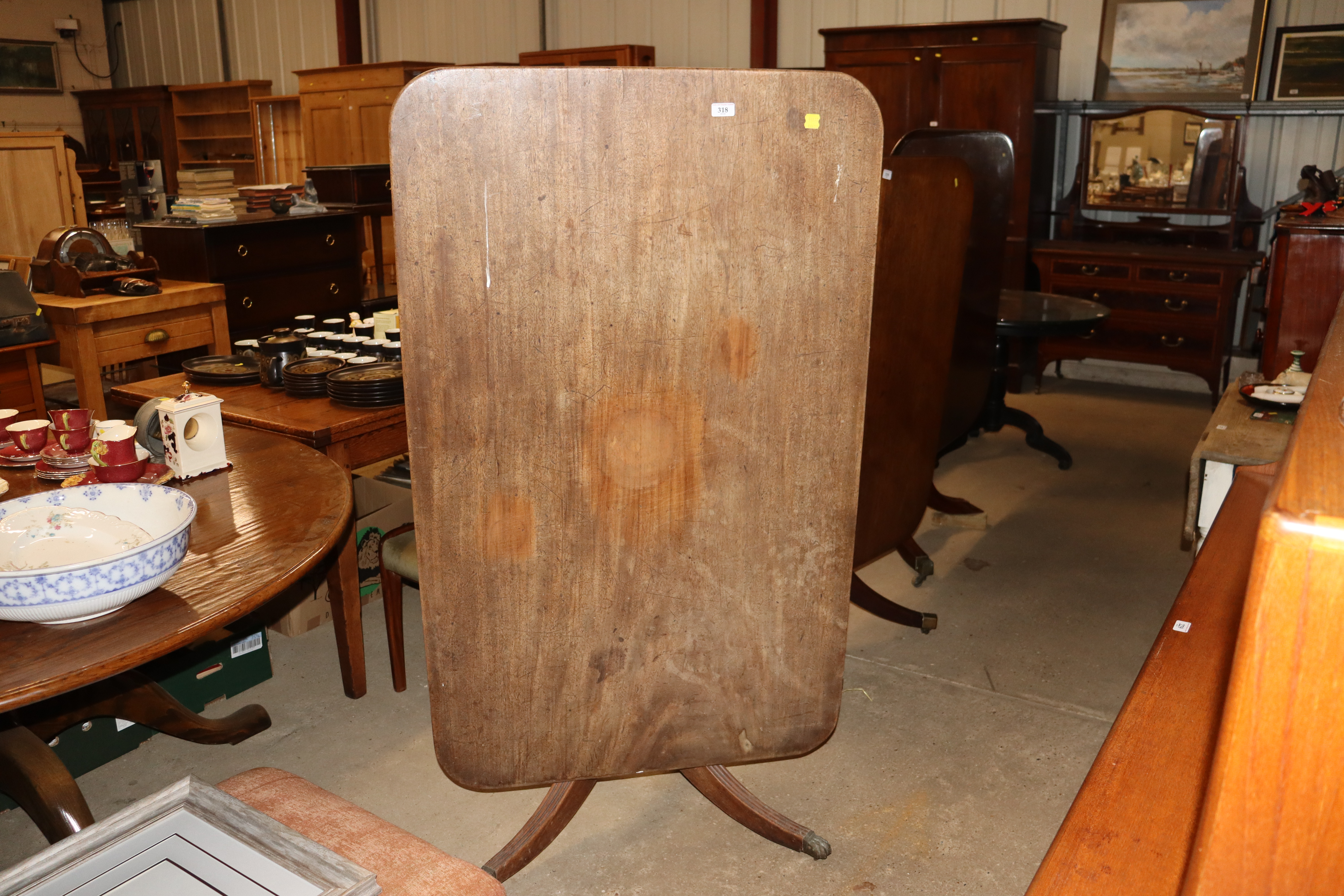 A 19th Century mahogany snap top supper table AF