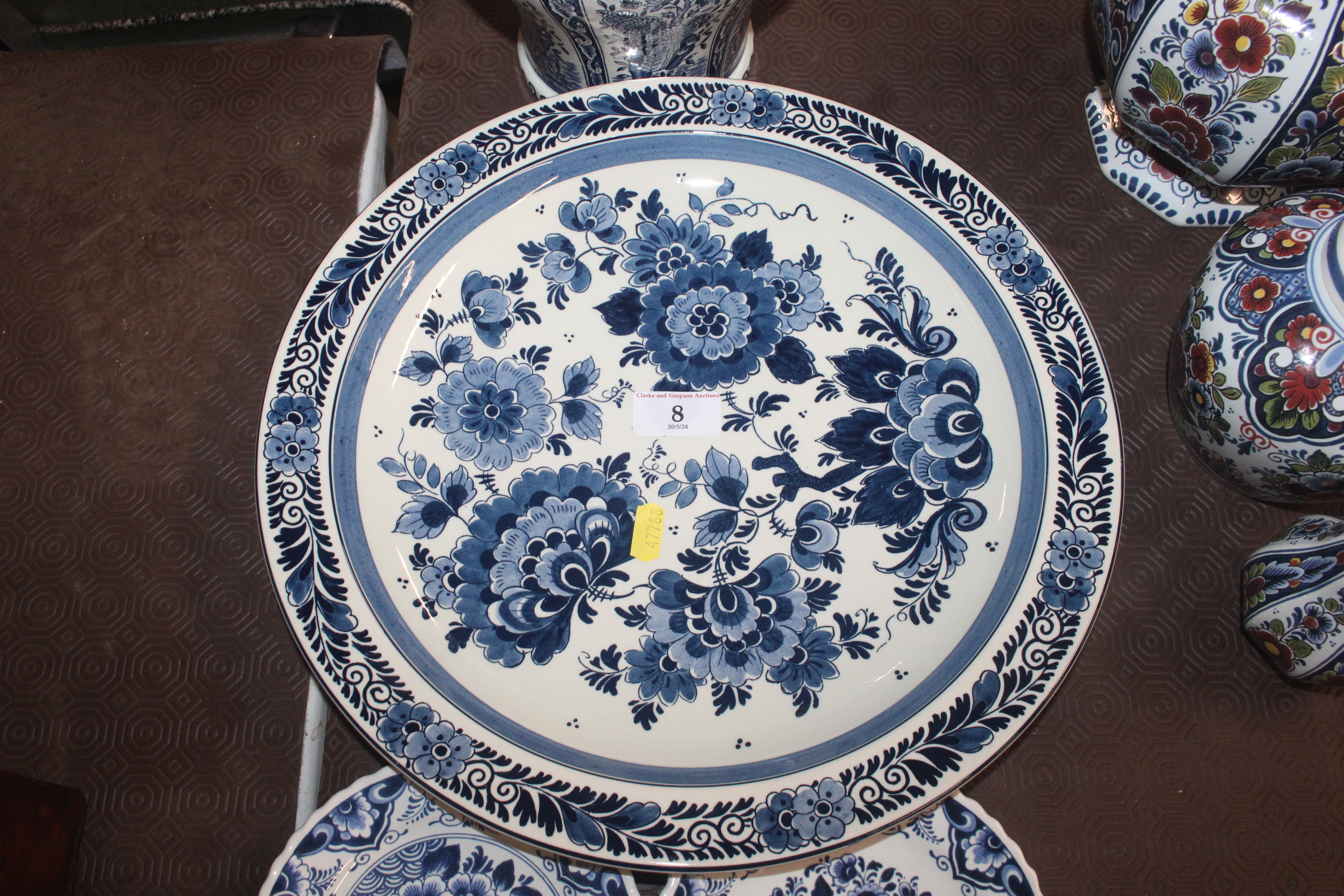 A Delft baluster vase and lid; a charger and three - Image 6 of 12