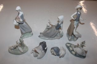 Seven Lladro and Nao ornaments - some AF