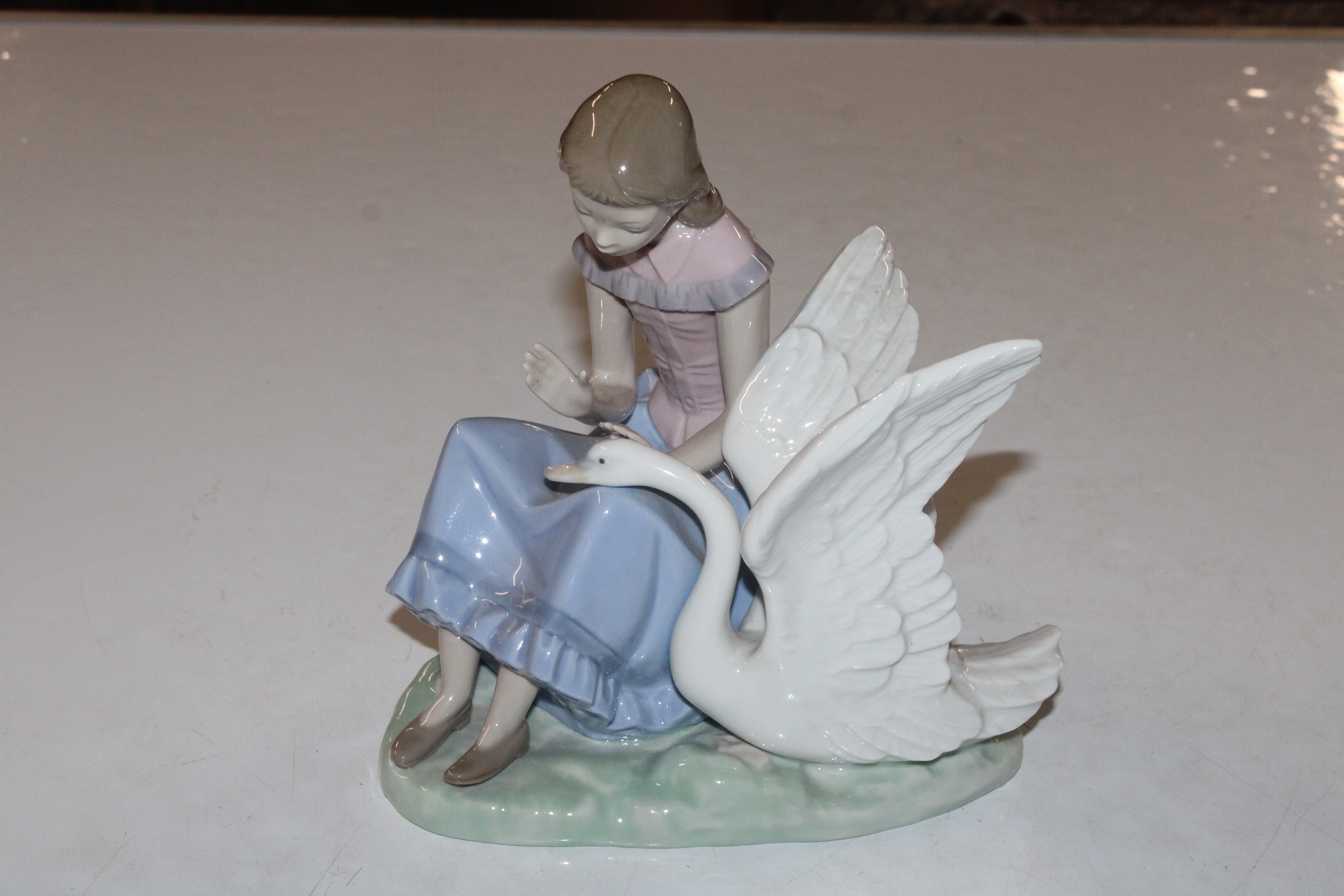 A Nao figure, young girl with swan and two Lladro - Image 6 of 11