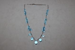 A blue topaz and Sterling silver necklace