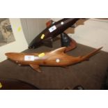 A large Polynesian carved hardwood shark with teet