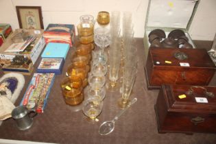 A collection of etched German glass flutes; variou