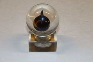 A Globule of North Sea Oil contained in a Lucite b