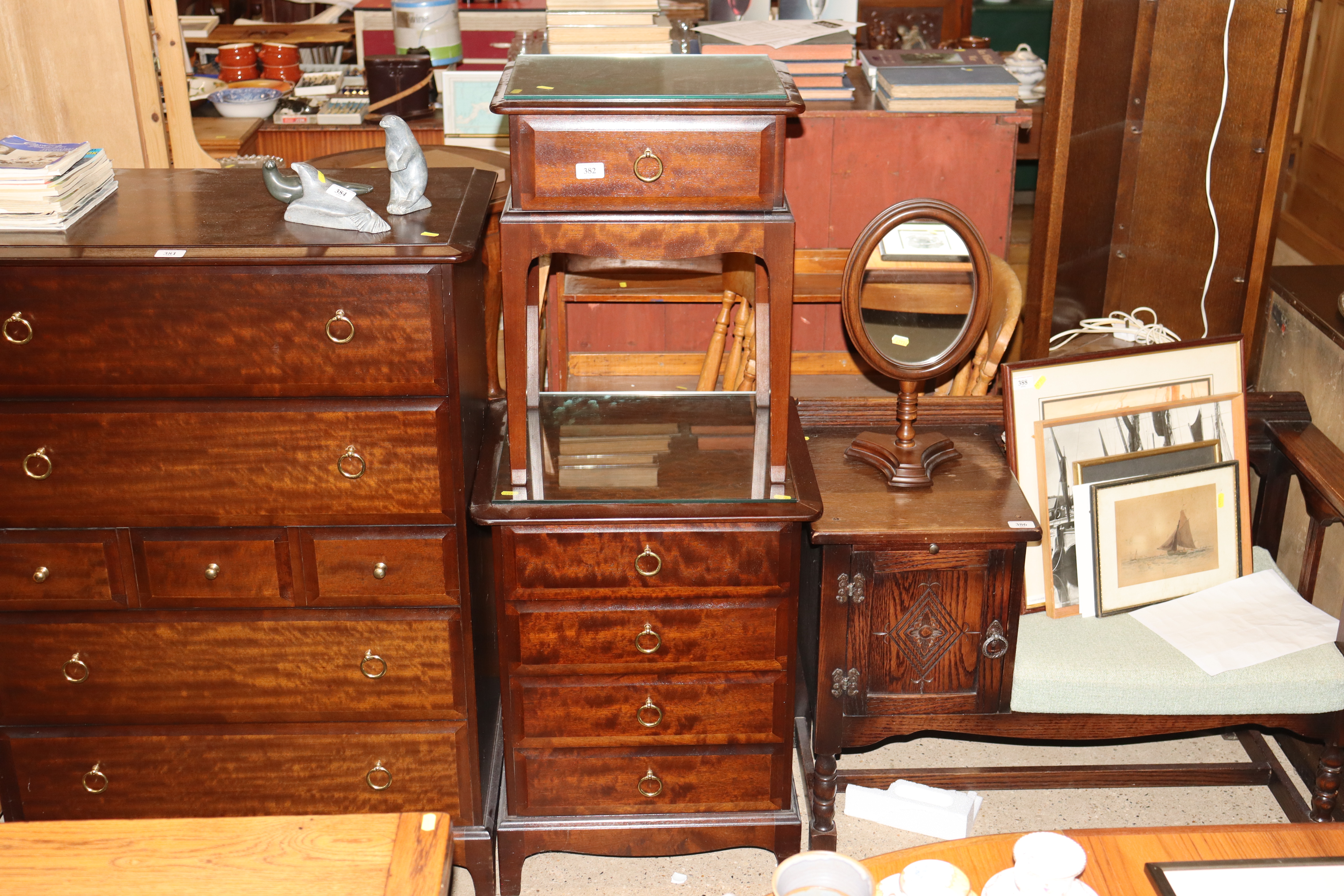 A Stag bedside chest fitted four drawers; and a St