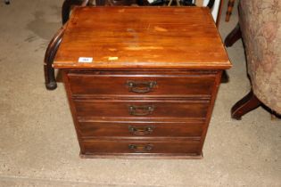A music chest of small proportions fitted four dra