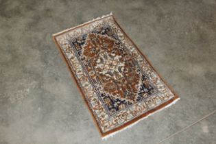An approx. 3'5" x 2" Eastern pattered rug
