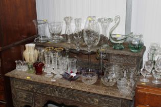 A collection of glassware to include a pair of can