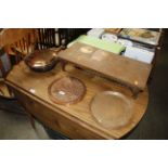 A copper warming pan, copper warming tray, two cop