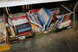 Three boxes containing cookery books and others