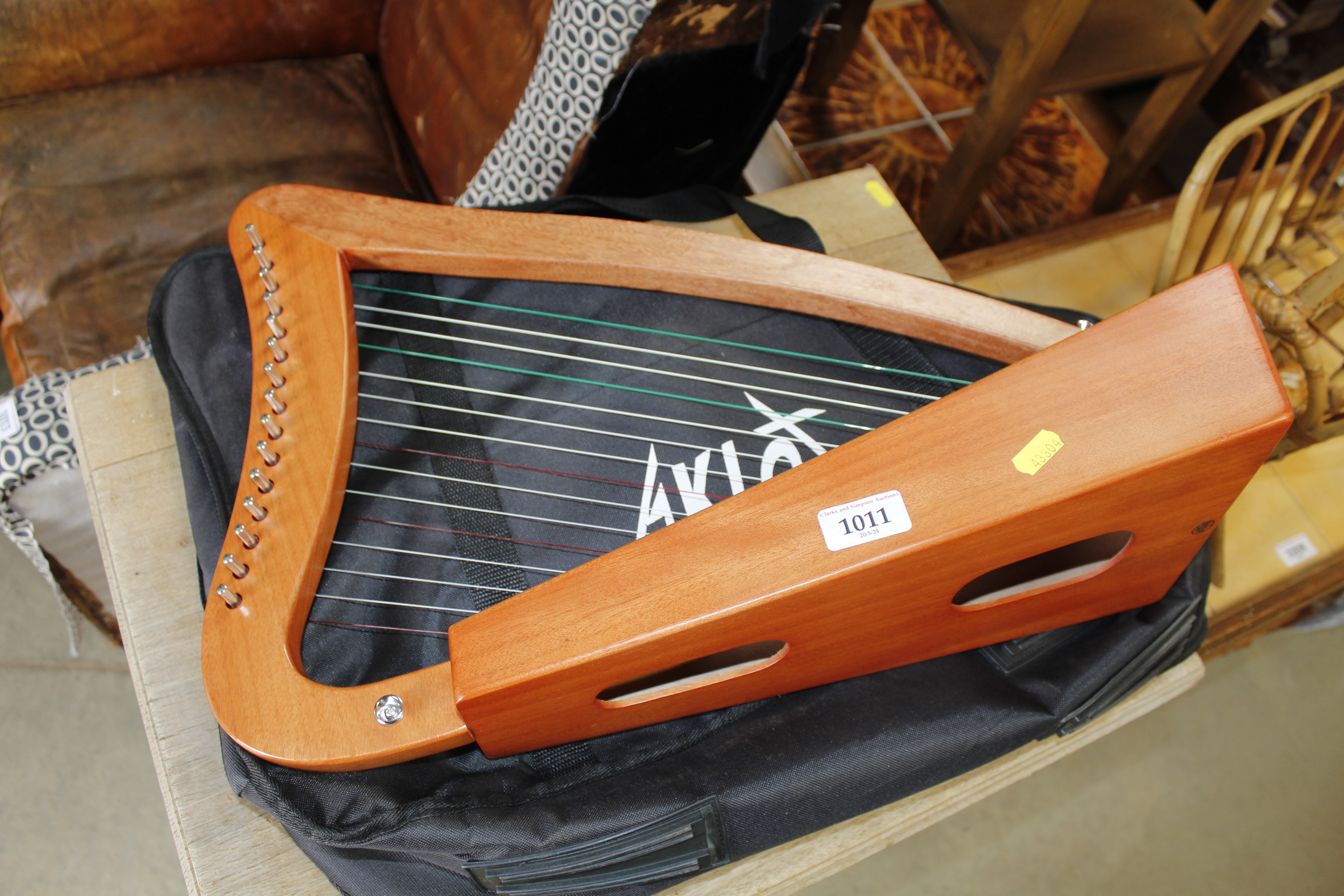 An Alclot harp with carry case