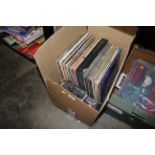 A box of records and CDs