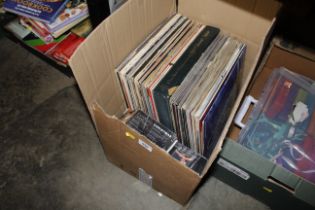 A box of records and CDs