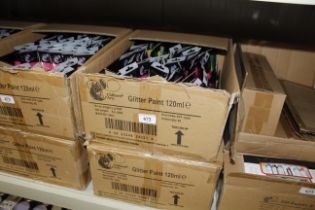 Two boxes containing a quantity of glitter paint