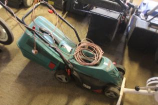 A Bosch Rotak 34R electric garden lawn mower