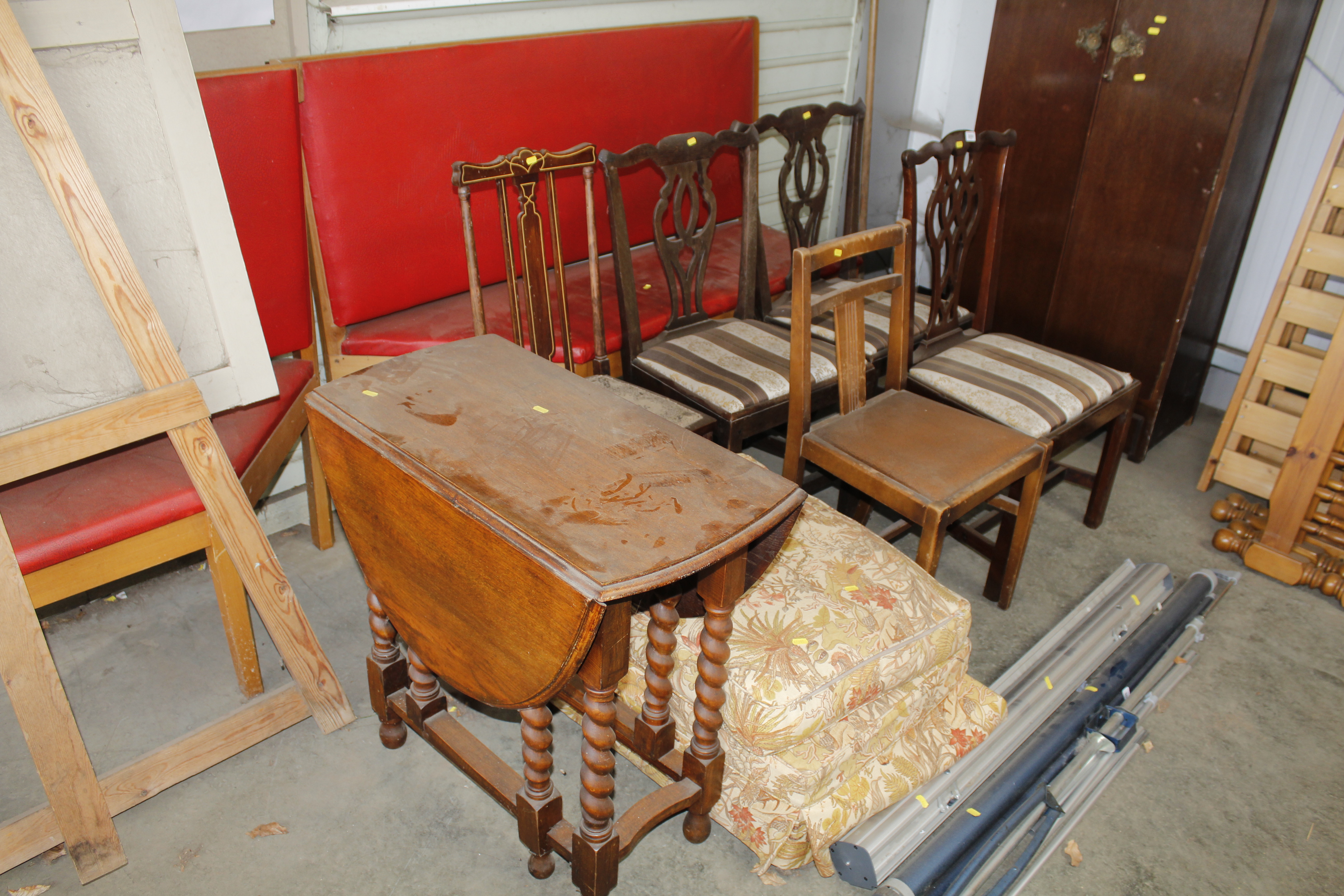 An oak drop leaf table, three Chippendale style ch