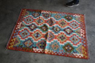 An approx. 4'10 x 3'3" Chobi Kilim rug