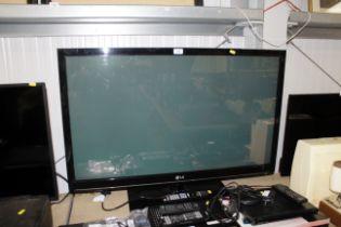 An LG television with remote control