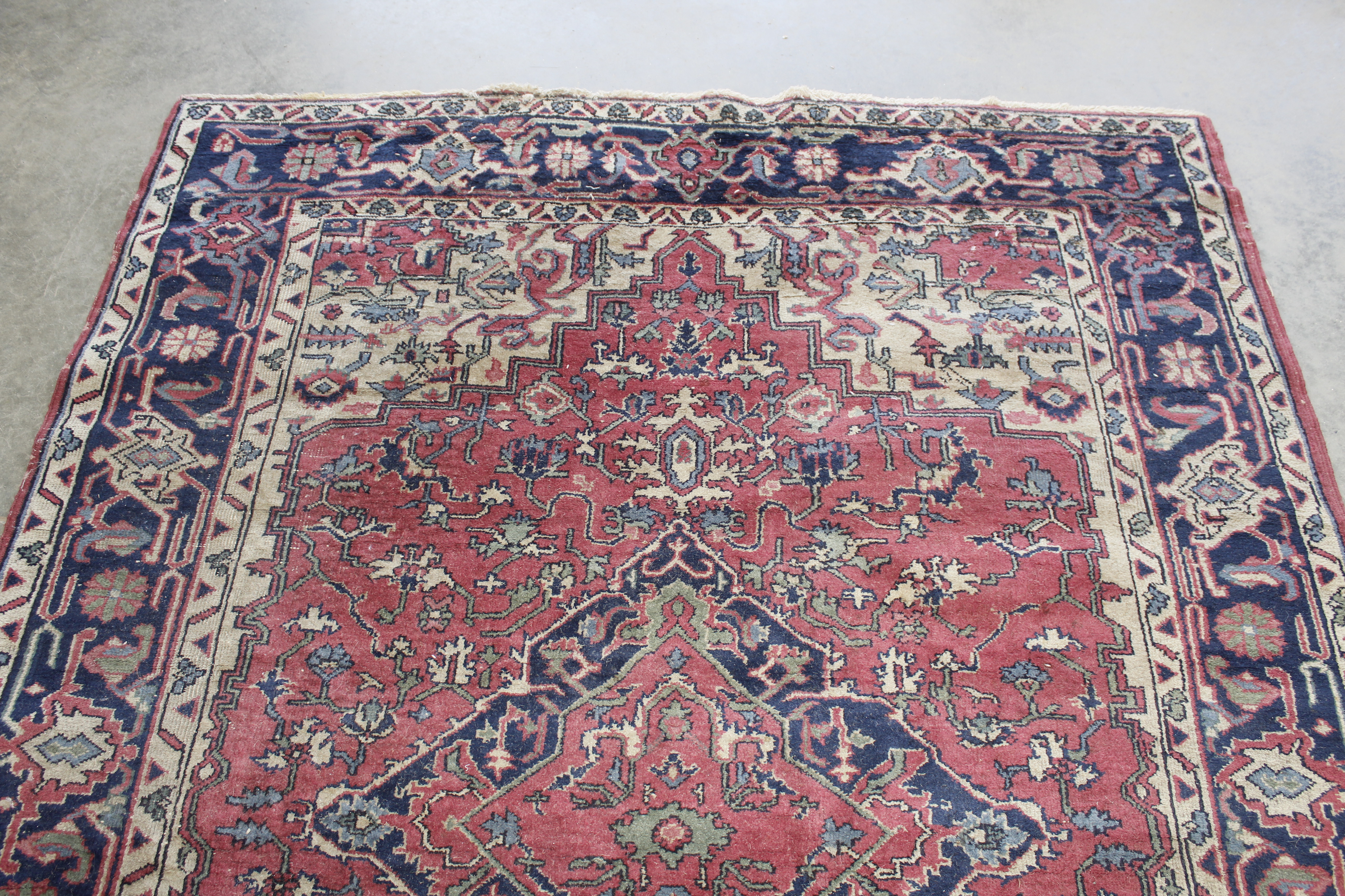 An approx. 9" x 6" blue and red patterned rug - Image 4 of 5