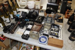 A collection of vintage and other cameras, various