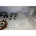 A collection of cut glass drinking glasses