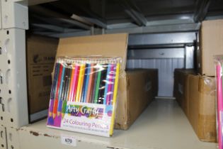 A box containing sets of 24 colouring pencils