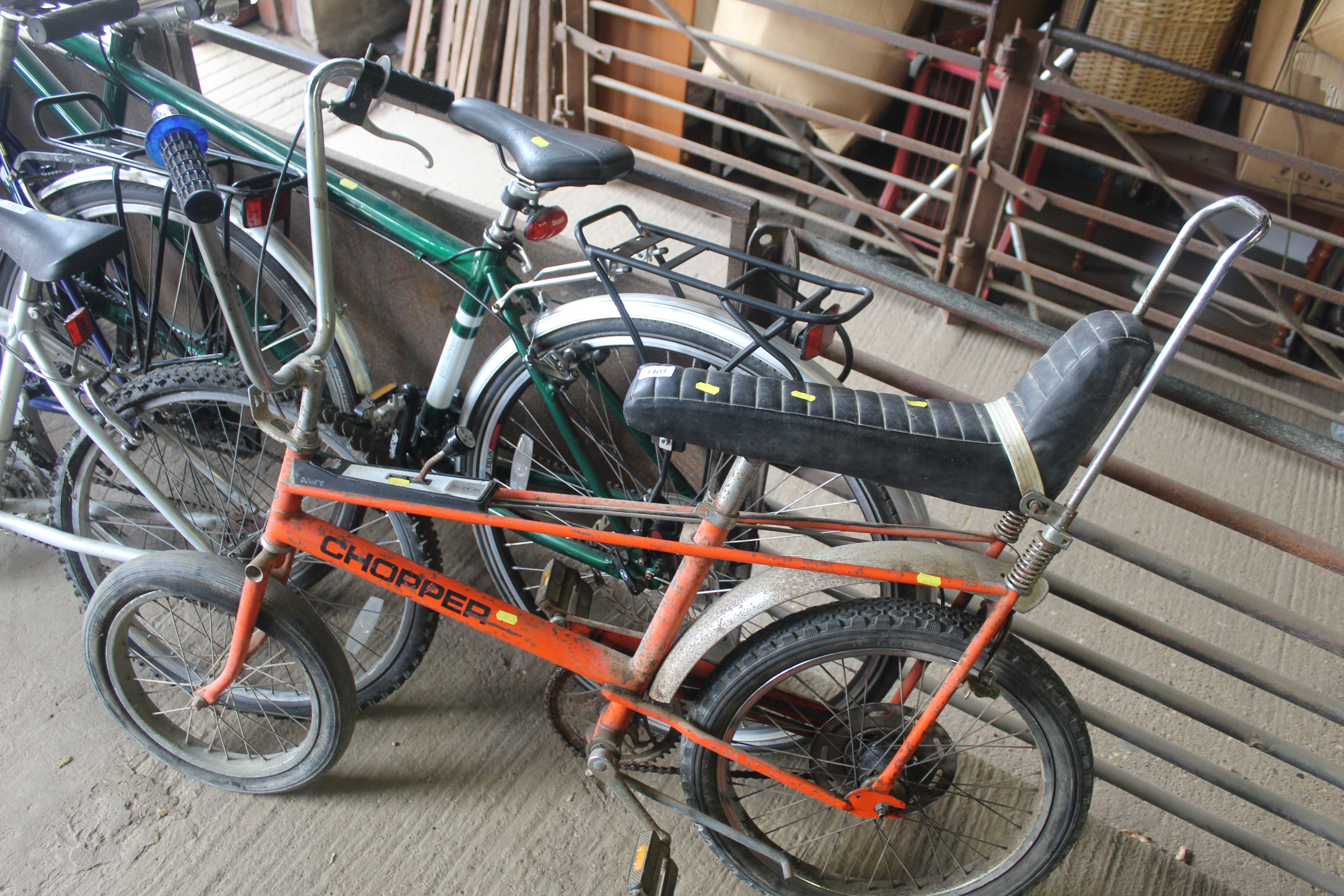 A vintage Raleigh Chopper with 3 speed gears, rear mud guard.